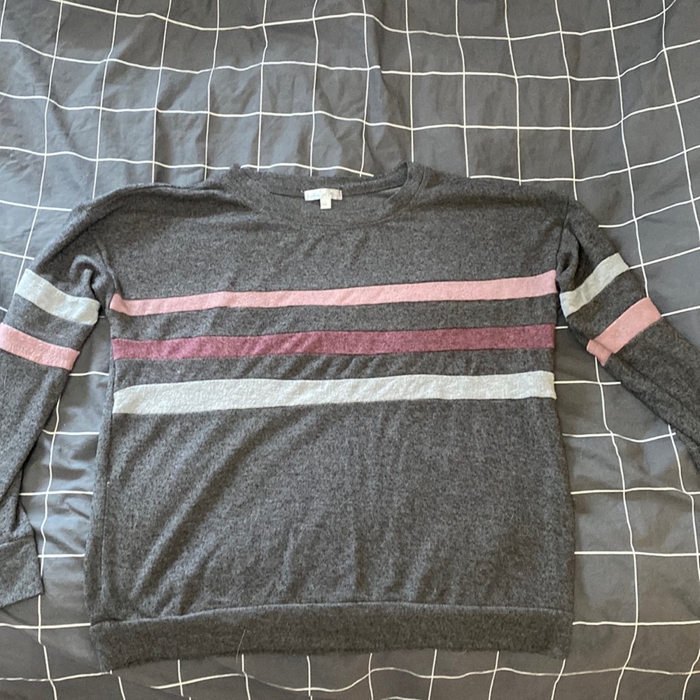 A size large gray sweater with stripes. The brand is Nine Britton